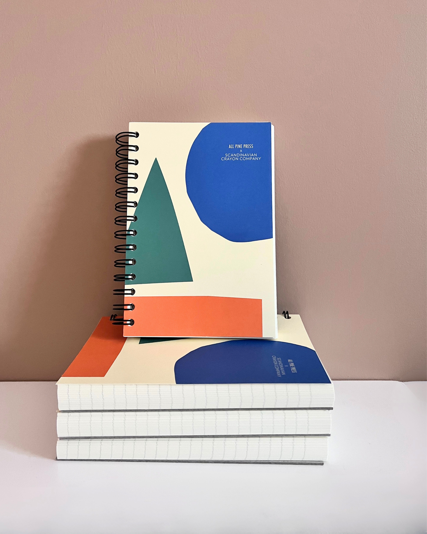 stack of spiral bound lined notebooks